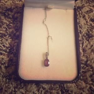 Amethyst necklace. 14 karat white gold detail